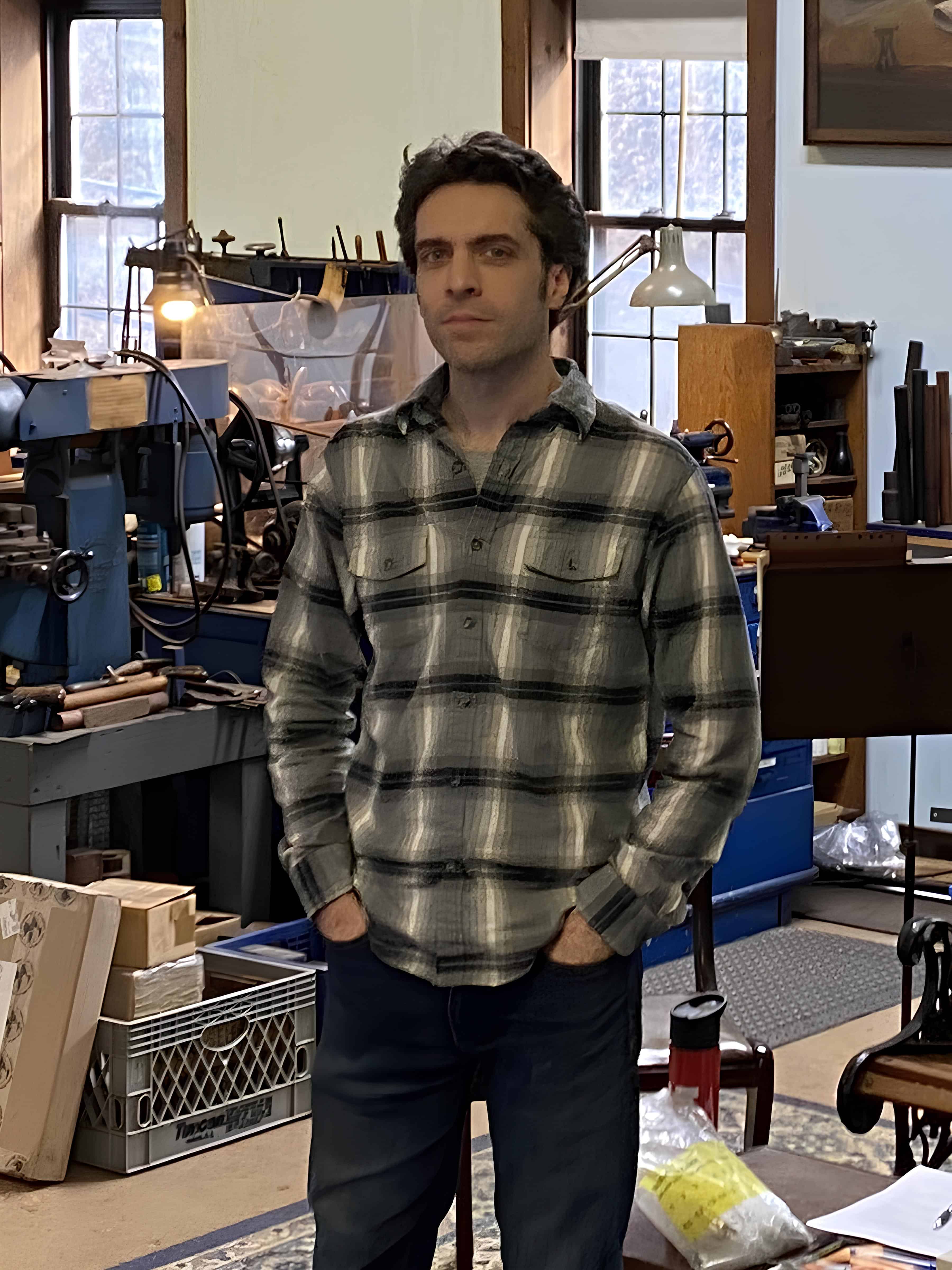 Alex Laubin standing in his workshop